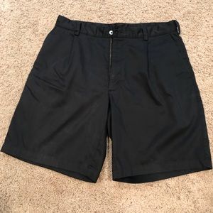 Black Nike golf shorts.